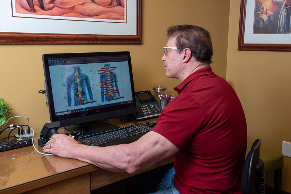Dr. Kelly at his desk