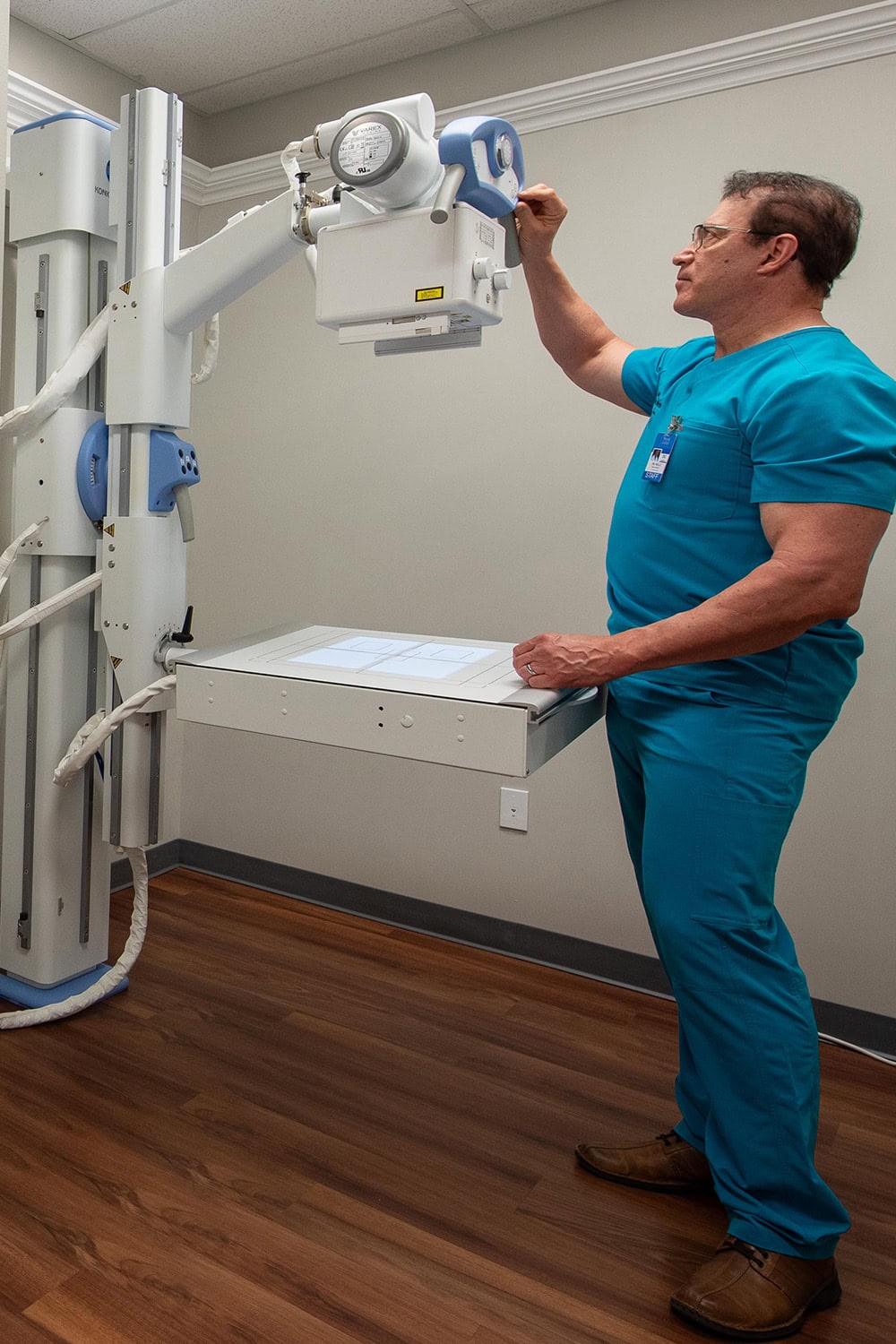 Dr. Kelly with X-ray equipment